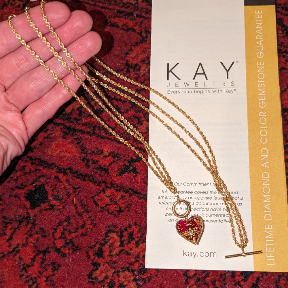 14 k gold necklace with gold dipped glass heart pendant. Kay Jewelers